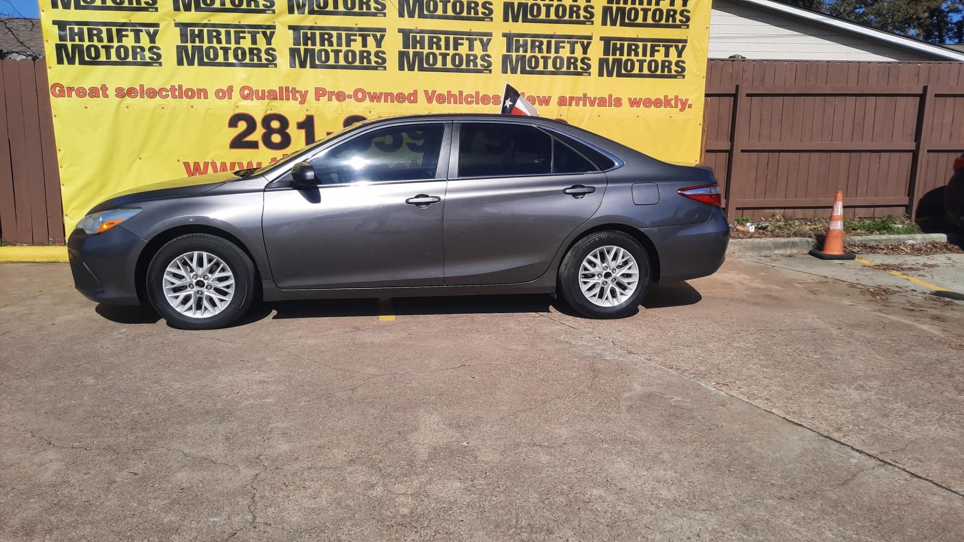 2016 Toyota Camry (4T4BF1FK8GR) , located at 16710 Clay Rd., Houston, TX, 77084, (281) 859-7900, 29.834864, -95.656166 - Photo#1